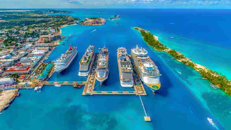 aerial photography of white and blue cruise ships during daytime - Cruise ships in the Bahamas., tags: der bahamas - unsplash
